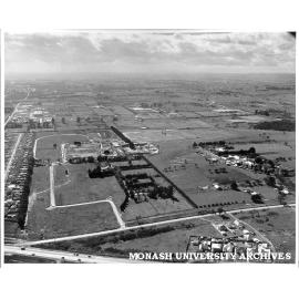 Aerial view of campus from south with Wellington Road in foreground