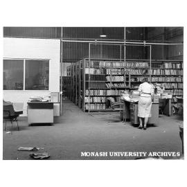 Early library accommodation in Volkswagon factory, Princes Highway