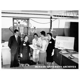 Visitors to Chemical Engineering laboratories. Professor Noel Murray (left), Mrs Janet Horn (centre) and Mrs Joan Street (right) in Chemical Engineering laboratories following university opening ceremony