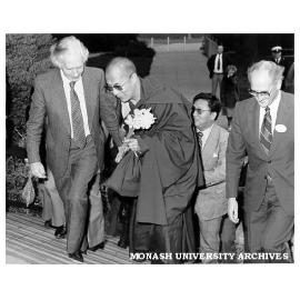 Dalai Lama, Deputy Vice-Chancellor Professor Kevin Westfold (left) and Dean of Medicine Professor Graeme Schofield (right)