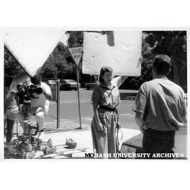 Actors Lisa Armytage and Paul Keenan filming 'Neighbours' on campus