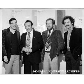 Mr Al Grassby (second left) at Centre for Migrant Studies with from left: Associate Professor Michael Clyne, Deputy Chairman of Centre; John McKay of Geography; and Dr Gil Best