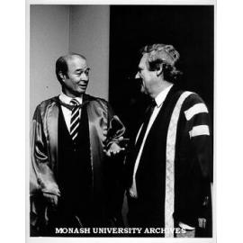 Dr Mechai Viravaidya (left), with Vice-Chancellor Professor Mal Logan, after being awarded honorary Doctor of Medicine