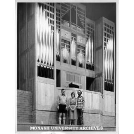 Jurgen and Ruth Ahrend and Director of Robert Blackwood Hall Dr Ian Hiscock, in front of organ