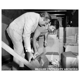Director of Robert Blackwood Hall Dr Ian Hiscock and Consul General of Germany Dr F. Kroneck inspecting crates in organ container