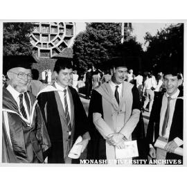 Associate Professors Bill Brown (left) and Ian Rae (second right) with sons Stuart Rae (second left) and Andrew Brown