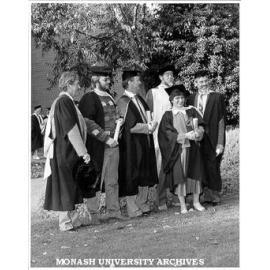 Graduates in Master of Public Health. Drs Nick Crofts, Michael Ackland, Cathy Finocchiaro and John Cole - with senior lecturer Dr Geoff Cross (left) and course co-ordinator Dr Tony Ryan (rear)