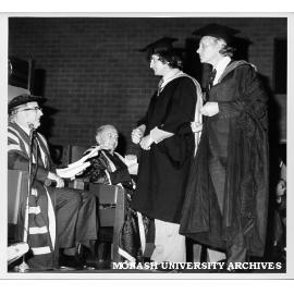 Mr K. N. G. Simpson receiving honorary Master of Science from Deputy Chancellor Ian Langlands