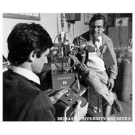 Mr Arvind Shrivastava (right), lecturer in Mechanical Engineering with student Tony Wood at controls of 4DOF Pick-and-Place-Robot