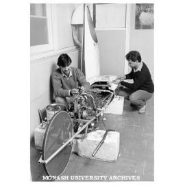 Mechanical Engineering students Mr Dennis Stathos and Mr Dominique Adrien working on Chisholm 80, one of Chisholm's entries in Shell Mileage Marathon