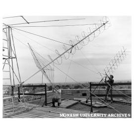Electrical engineering students with antennae designed to communicate with ATS-1 satellite with Michael Little and Andrew Edwards