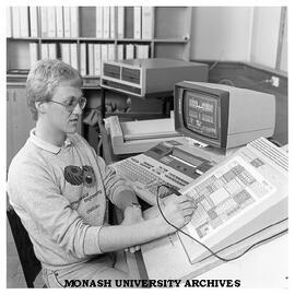 Student Stephen Jackson with Computer Aided Drafting system