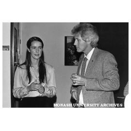 Library staff Jenny Barwick and Patrick Condon at wine tasting