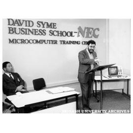Opening of David Syme Business School-NEC microcomputer laboratory. Minister for Science and Technology Mr Barry Jones (right)and Managing Director of NEC Australia, Mr K. Kagiyama