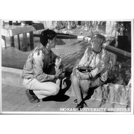Dame Elisabeth Murdoch at opening of solar powered fountain at Footscray Institute of Technology, designed by Chisholm Ceramic Design student Robert Mills (left)