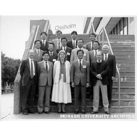 Mr Michael Collins (front left) with Daimaru executives