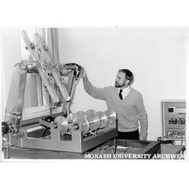 Robotics Centre consultant Mr Peter Wenn with conveyor interface