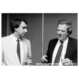 Paul Ramler (left), President of Chisholm Council, discussing merger with Monash Vice-Chancellor Professor Mal Logan after signing Heads of Agreement