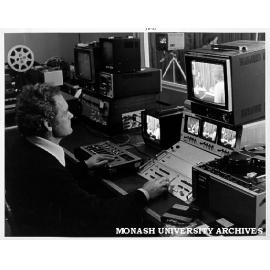 Mr Nobby Clarke of EDU, producing video for student instruction