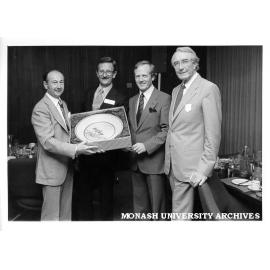 Presentation from Georges visiting executive Ron Everingham (2nd left), Mike Collins (left), Ken McDonald (Retail Traders Association Vic.), and CIT Director Ron Cumming