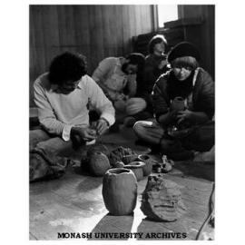 Students making clay pots at camp on French Island