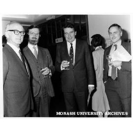 Opening of Graphic Design students' exhibition in London. Organiser Mr Ted Worsley (left) with guests: Mr Robert Strand, Victorian Agent General Mr Ian Haig, and Mr Christopher Lucas