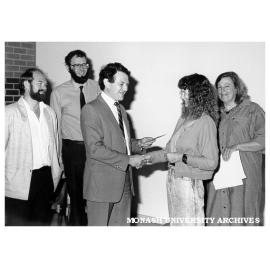 Ceramic Design student Denise Mitchell receiving award from Jeffery Lowenger of Z-Tech, watched by, from left: Stephen Fletcher, Ceramic Design; David Parris, Z-Tech; and Jenny Zimmer, Dean of Art and Design