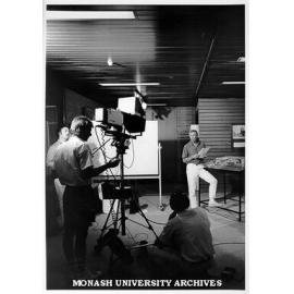 Peter Couchman working with EDU staff, from left: Peter Taylor, Rob Pignolet and John Blyth