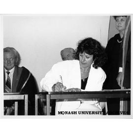 Signing of Monash-GIAE Affiliation agreement, Student representative Ms Fatima Alisak (Chairperson of Monash Association of Students), Gippsland Institute Director Dr Tom Kennedy (left) looking on