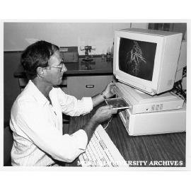 Principal lecturer John Harris demonstrating CD-ROM