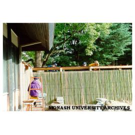 Laying capping of Kenninji style fence, Japanese Garden