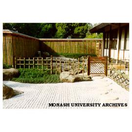Yotsume style fence, Japanese Garden and gate leading from the stone (sekitei) garden, into the dry landscape (karesansui) garden
