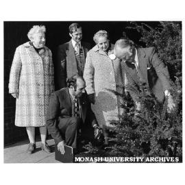 Curator John Cranwell (right) with visitors to gardens, from left Miss Daphne Pearson, Mr Bob Whitehead, Miss Mervyn Davis, and (kneeling) Mr Kevin Heinze