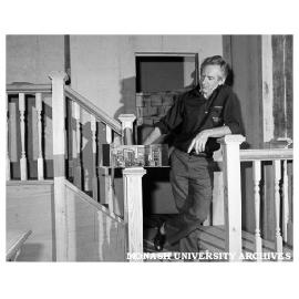 Graham McGuffie, Alexander Theatre technician, on set designed for 'Down an Alley Filled With Cats'