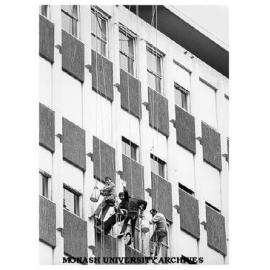 Cleaning north face of Menzies building, from left: Leslie Jasinowski, Jaromir Bartos, Geoff Minns and Josef Motycka