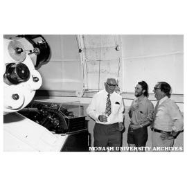 Dr Louis Matheson and guests inside Monash Observatory following opening ceremony. Deane Blackman (right)