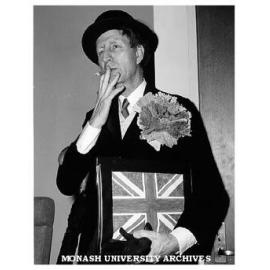 Professor Ken Hunt dressed to lead English contingent of audience in 'The Stone Wall'