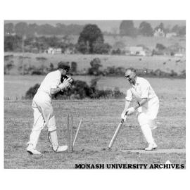 First Monash University cricket match, Vice-chancellors XI v Students XI, 28 November 1961. Vice-chancellor Dr Louis Matheson, (right)