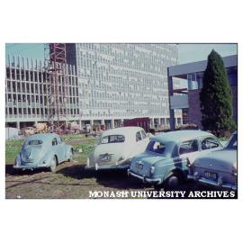 Menzies building, second stage under construction, with University Union at right