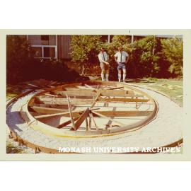 Foundations for fountain in Engineering courtyard with John Trembath and John McFee at rear