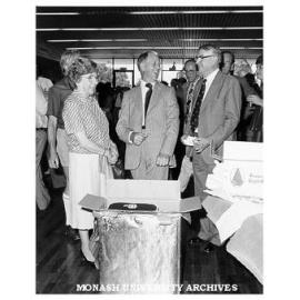 Mr Len Candy (centre), Mr Jim Butchart and Mrs Isabel Butchart at farewell function for retiring Comptroller and retiring Registrar