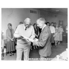 Doug Ellis (left) and Professor Ron Brown at party for Doug's 25 years as Sports Administrator and Deputy Warden