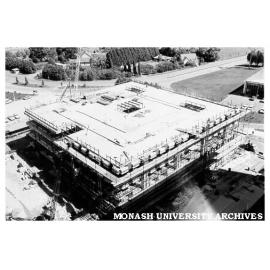 Law building under construction with Vice-Chancellor's house in background