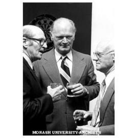 Retirement of T.S. Moore from Caulfield Technical College Student Records section. From left: W. Tucker, T. S. Moore, H. J. Halstead