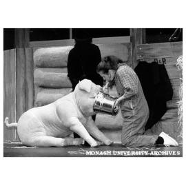 Scene from 'Charlotte's Web'. Elizabeth Paterson as Fern with Wilbur the pig.