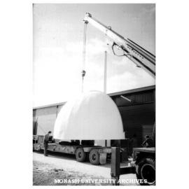 Loading Monash Observatory dome onto trailer for transportation to Mt. Burnett