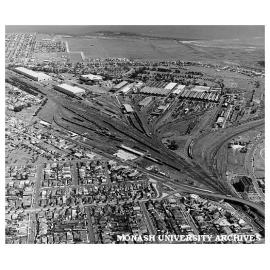 Aerial view of Newport railway workshops with Williamstown Rifle Range in background and Williamstown Cemetery in middleground (one of the very few sited on basalt)