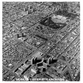 Aerial view of Carlton and Exhibition Building with high rise Housing Commission flats in forground and Melbourne CBD in top right