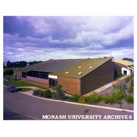 Swimming pool showing solar collectors on roof