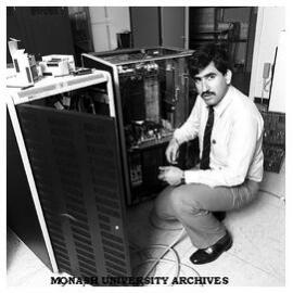 Digital field service engineer Mr Bambos Haralambous with digital VAX 11/750 central processor of the Business Technology Centre